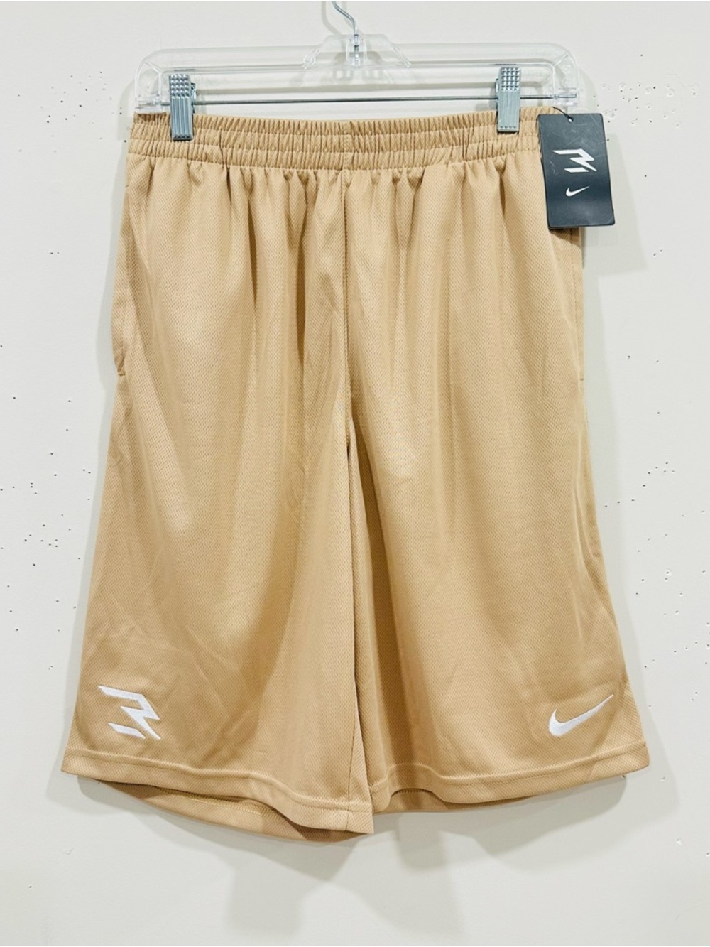 Nike Kids Beige/Tan Athletic Shorts with White Logos